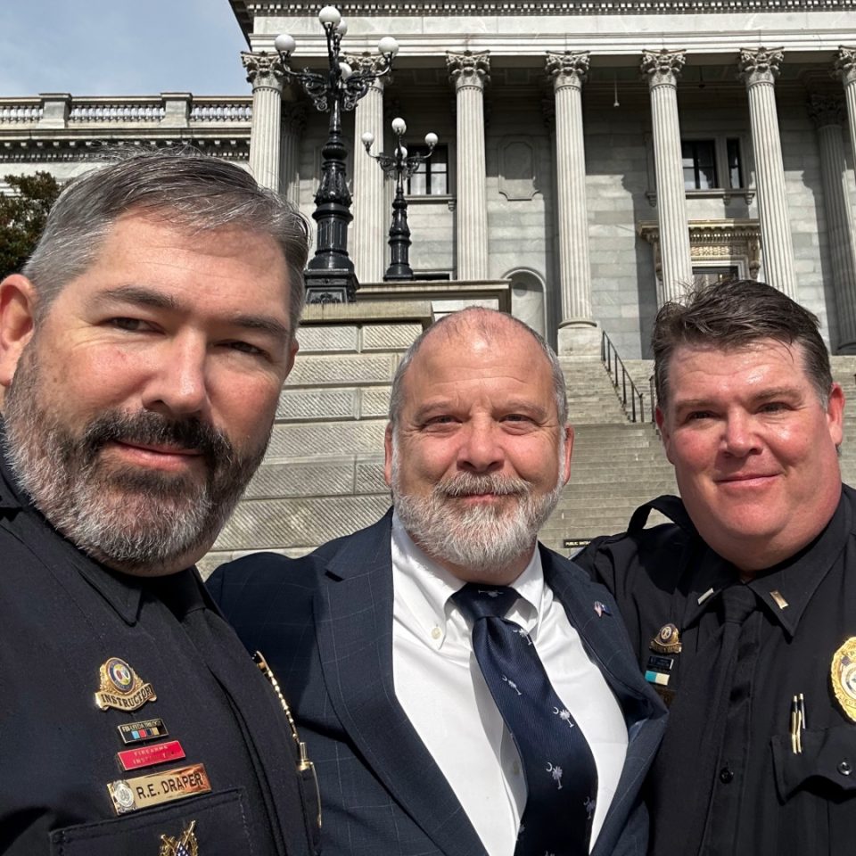 Summerville-Dorchester Lodge #48 member Ralph Draper, Senator Brian Adams, and Tri-County Lodge #3 member Joe Niemeic